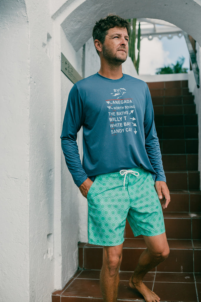 Man in stairwell wearing sun protection shirt